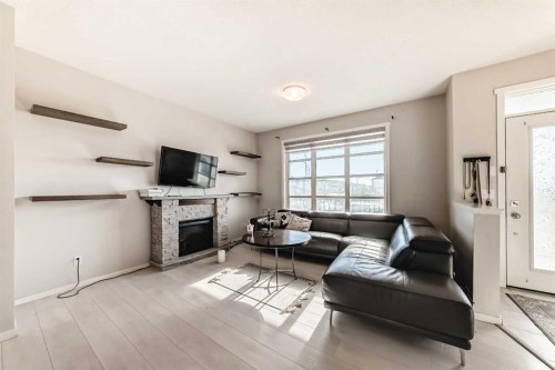 199 Savanna Parade Ne, Calgary, AB - Indoor Photo Showing Living Room With Fireplace