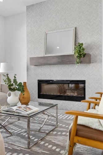 1090 Bayview Crescent, Airdrie, AB - Indoor Photo Showing Living Room With Fireplace