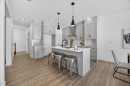1090 Bayview Crescent, Airdrie, AB  - Indoor Photo Showing Kitchen With Upgraded Kitchen 