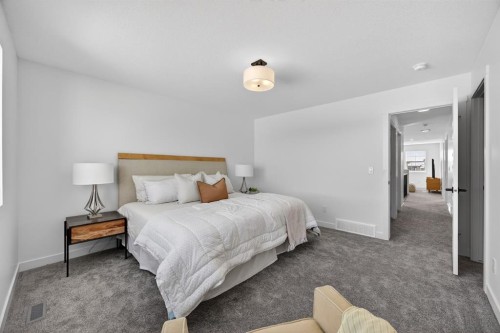 1090 Bayview Crescent, Airdrie, AB - Indoor Photo Showing Bedroom
