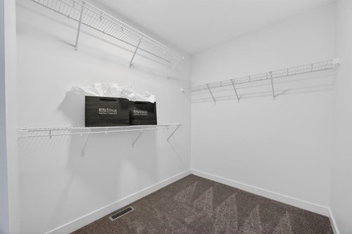 1090 Bayview Crescent, Airdrie, AB - Indoor With Storage