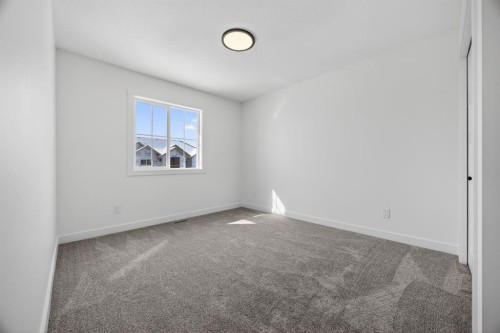 1090 Bayview Crescent, Airdrie, AB - Indoor Photo Showing Other Room