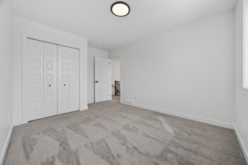 1090 Bayview Crescent, Airdrie, AB - Indoor Photo Showing Other Room
