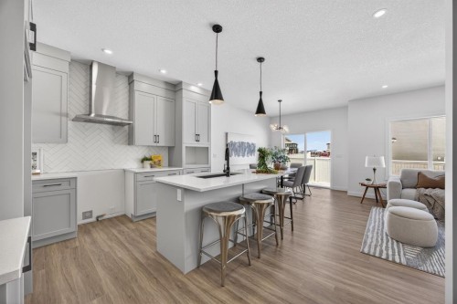 1090 Bayview Crescent, Airdrie, AB - Indoor Photo Showing Kitchen With Upgraded Kitchen
