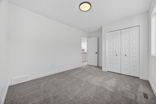 1090 Bayview Crescent, Airdrie, AB - Indoor Photo Showing Other Room