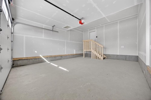 1090 Bayview Crescent, Airdrie, AB - Indoor Photo Showing Garage