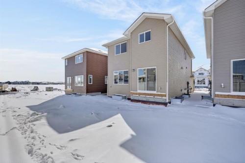 1090 Bayview Crescent, Airdrie, AB - Outdoor With Exterior
