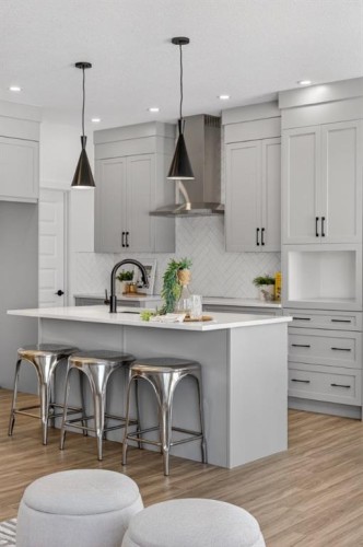 1090 Bayview Crescent, Airdrie, AB - Indoor Photo Showing Kitchen With Upgraded Kitchen