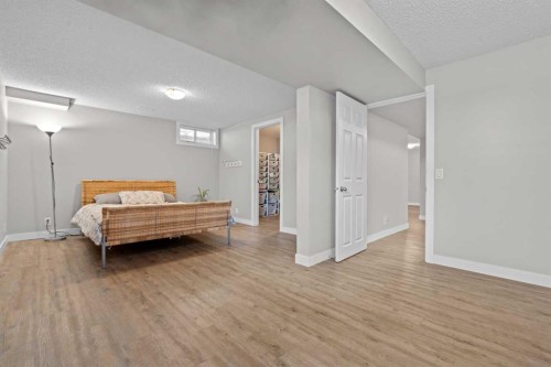 232 Ranchview Place Nw, Calgary, AB - Indoor Photo Showing Bedroom