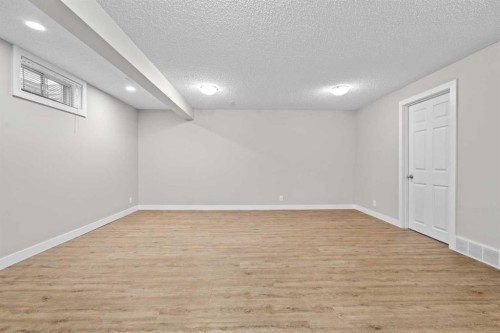 232 Ranchview Place Nw, Calgary, AB - Indoor Photo Showing Other Room
