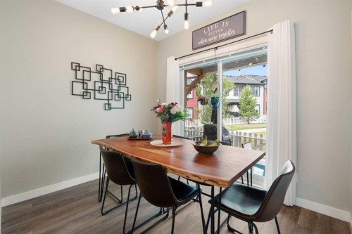 1306 Jumping Pound Common, Cochrane, AB - Indoor Photo Showing Dining Room