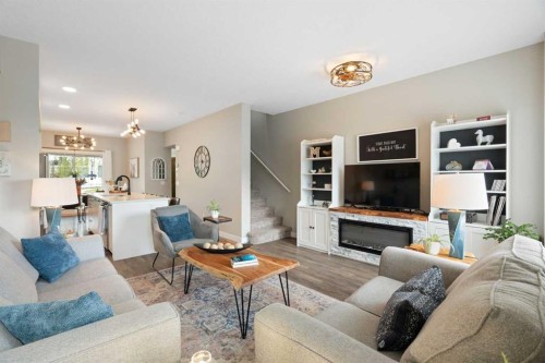 1306 Jumping Pound Common, Cochrane, AB - Indoor Photo Showing Living Room