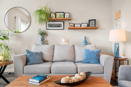 1306 Jumping Pound Common, Cochrane, AB - Indoor Photo Showing Living Room