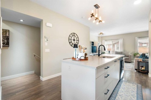 1306 Jumping Pound Common, Cochrane, AB - Indoor Photo Showing Kitchen