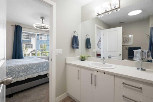 1306 Jumping Pound Common, Cochrane, AB - Indoor Photo Showing Bathroom
