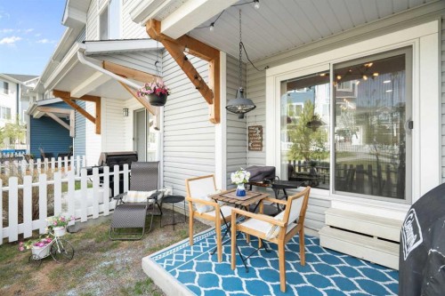 1306 Jumping Pound Common, Cochrane, AB - Outdoor With Deck Patio Veranda