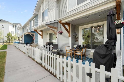 1306 Jumping Pound Common, Cochrane, AB - Outdoor With Deck Patio Veranda