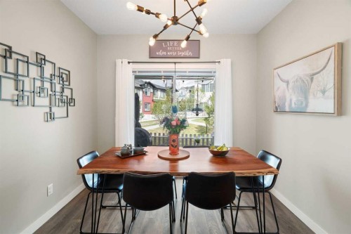 1306 Jumping Pound Common, Cochrane, AB - Indoor Photo Showing Dining Room