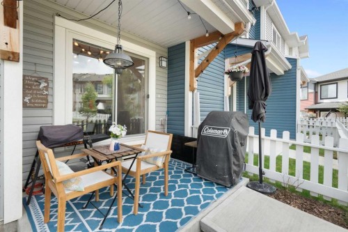 1306 Jumping Pound Common, Cochrane, AB - Outdoor With Deck Patio Veranda