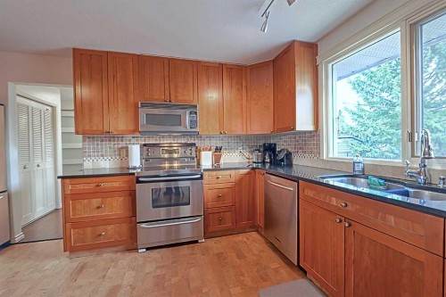 5940 Dalkeith Hill Nw, Calgary, AB - Indoor Photo Showing Kitchen With Stainless Steel Kitchen With Double Sink