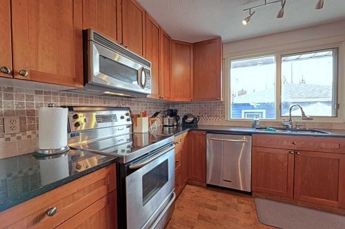 5940 Dalkeith Hill Nw, Calgary, AB - Indoor Photo Showing Kitchen With Stainless Steel Kitchen