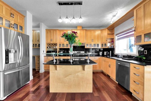 69-39 Strathlea Common Sw, Calgary, AB - Indoor Photo Showing Kitchen With Stainless Steel Kitchen With Double Sink
