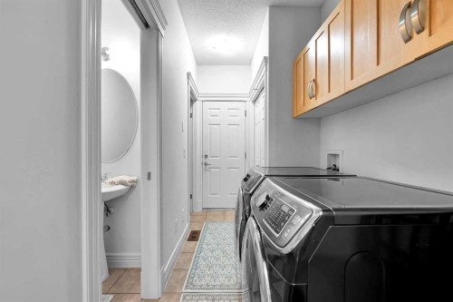 69-39 Strathlea Common Sw, Calgary, AB - Indoor Photo Showing Laundry Room