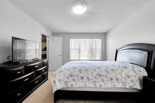 69-39 Strathlea Common Sw, Calgary, AB - Indoor Photo Showing Bedroom