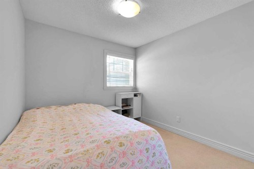 69-39 Strathlea Common Sw, Calgary, AB - Indoor Photo Showing Bedroom