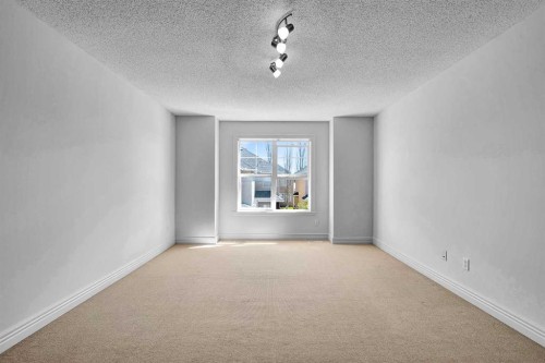 69-39 Strathlea Common Sw, Calgary, AB - Indoor Photo Showing Other Room
