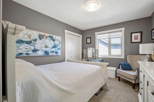 611 Montgomery Close Se, High River, AB - Indoor Photo Showing Bedroom