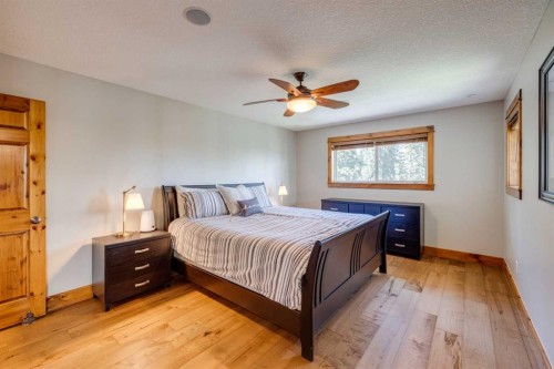 4 Highlands Place, Bragg Creek, AB - Indoor Photo Showing Bedroom