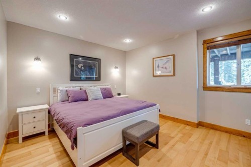 4 Highlands Place, Bragg Creek, AB - Indoor Photo Showing Bedroom