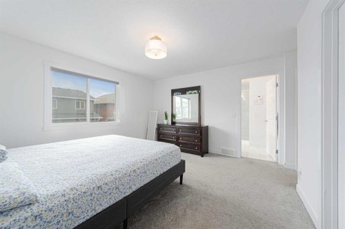 70 Saddlestone Green Ne, Calgary, AB - Indoor Photo Showing Bedroom