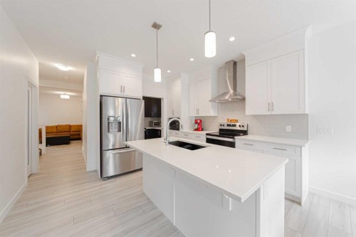 70 Saddlestone Green Ne, Calgary, AB - Indoor Photo Showing Kitchen With Upgraded Kitchen