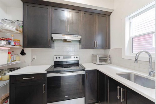 70 Saddlestone Green Ne, Calgary, AB - Indoor Photo Showing Kitchen With Upgraded Kitchen