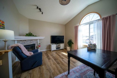 228 Oakmere Place, Chestermere, AB - Indoor With Fireplace
