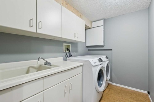 44 Scenic Cove Circle Nw, Calgary, AB - Indoor Photo Showing Laundry Room