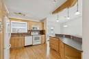 44 Scenic Cove Circle Nw, Calgary, AB  - Indoor Photo Showing Kitchen With Double Sink 