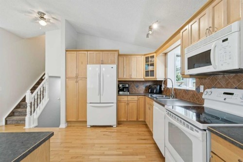 44 Scenic Cove Circle Nw, Calgary, AB - Indoor Photo Showing Kitchen With Double Sink