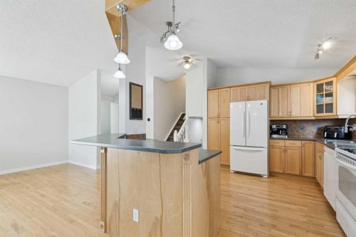 44 Scenic Cove Circle Nw, Calgary, AB - Indoor Photo Showing Kitchen With Double Sink