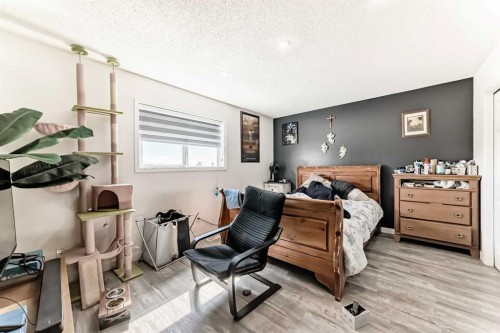 125 Coral Springs Bay Ne, Calgary, AB - Indoor Photo Showing Bedroom
