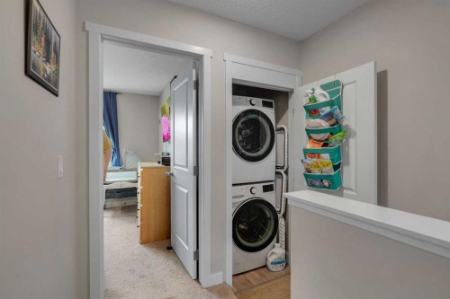 76 Carrington Boulevard Nw, Calgary, AB - Indoor Photo Showing Laundry Room