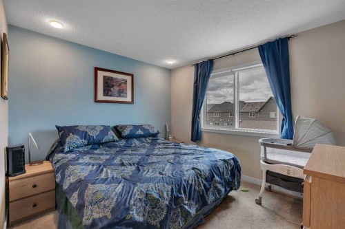 76 Carrington Boulevard Nw, Calgary, AB - Indoor Photo Showing Bedroom