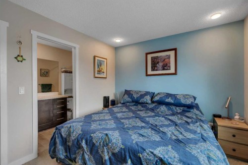 76 Carrington Boulevard Nw, Calgary, AB - Indoor Photo Showing Bedroom