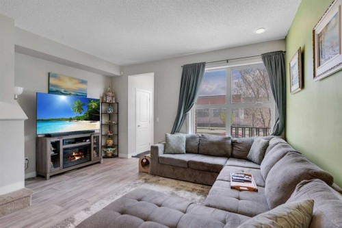 76 Carrington Boulevard Nw, Calgary, AB - Indoor Photo Showing Living Room