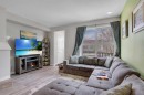 76 Carrington Boulevard Nw, Calgary, AB  - Indoor Photo Showing Living Room 