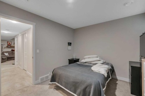 76 Carrington Boulevard Nw, Calgary, AB - Indoor Photo Showing Bedroom