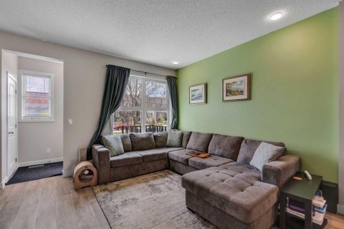 76 Carrington Boulevard Nw, Calgary, AB - Indoor Photo Showing Living Room