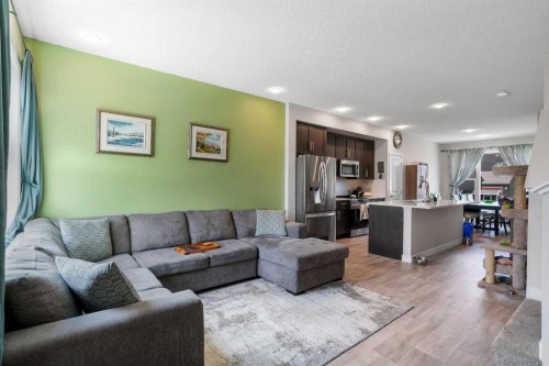 76 Carrington Boulevard Nw, Calgary, AB - Indoor Photo Showing Living Room